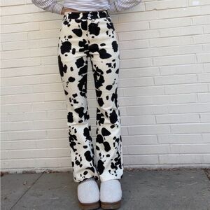 Super cute cow print high rise flare jeans!